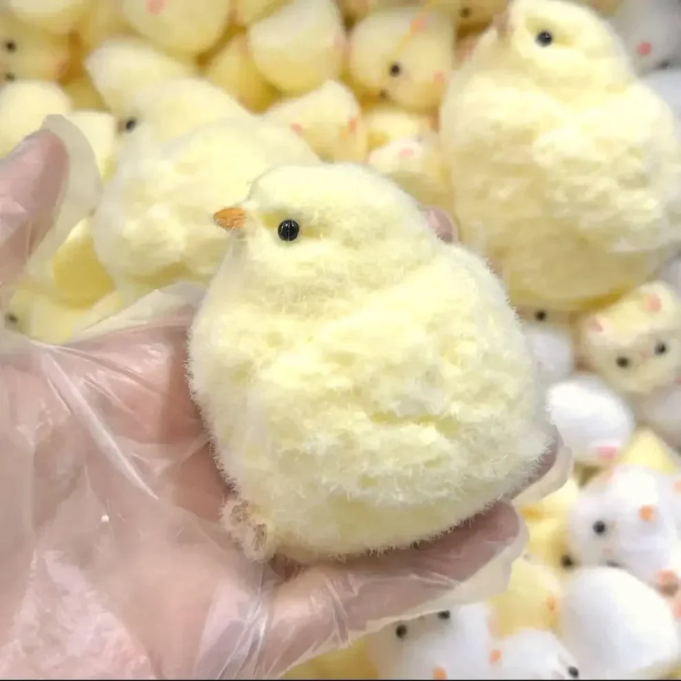 Soft yellow chick squishy fidget toy held in hand showcasing benefits of squishy fidget toys for tactile stimulation