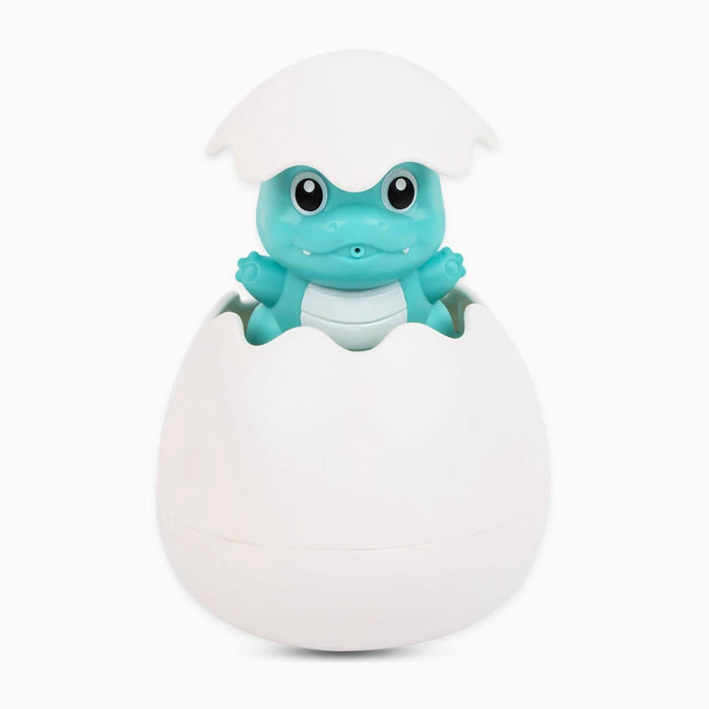Active Playthings baby bath toys water spray featuring a cute dinosaur hatching from an egg