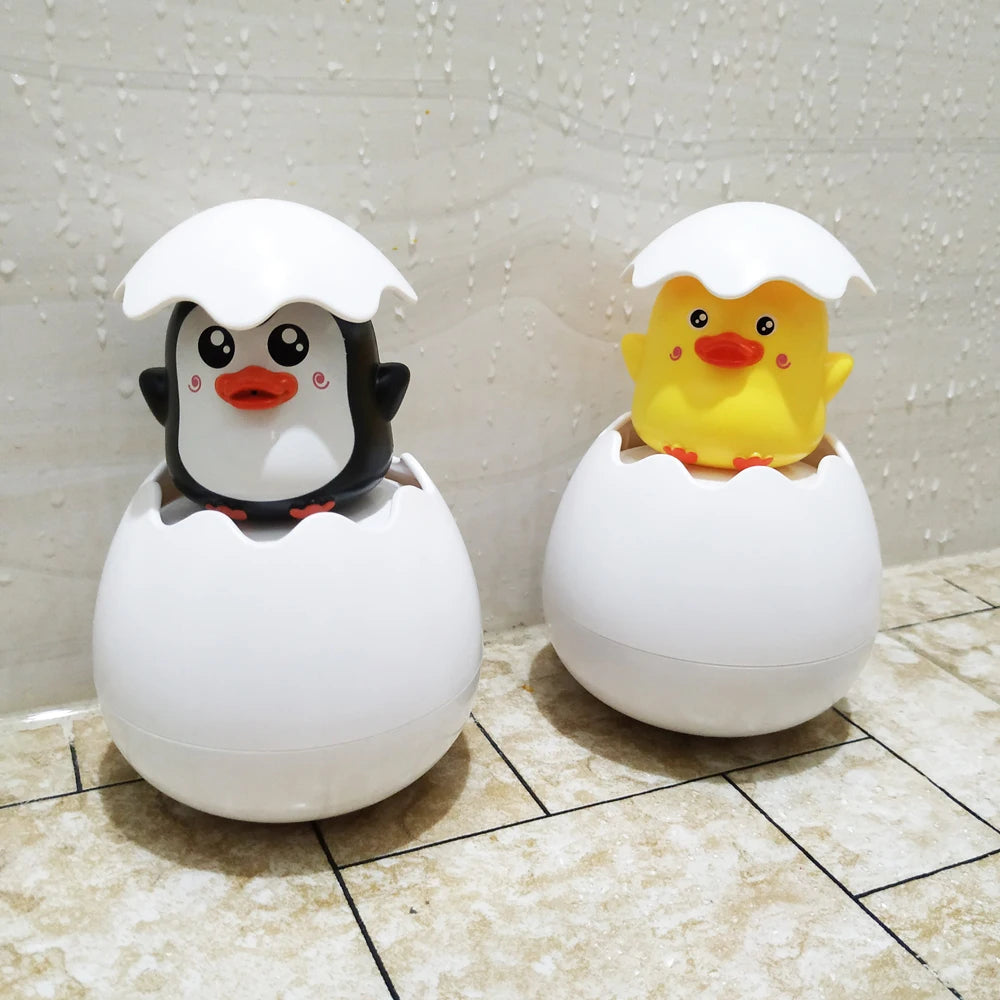 Active Playthings baby bath toys water spray featuring cute penguin and chick designs in egg shells
