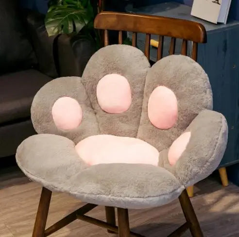 Cozy cat paw cushion seat in gray and pink, perfect for adding comfort to any chair
