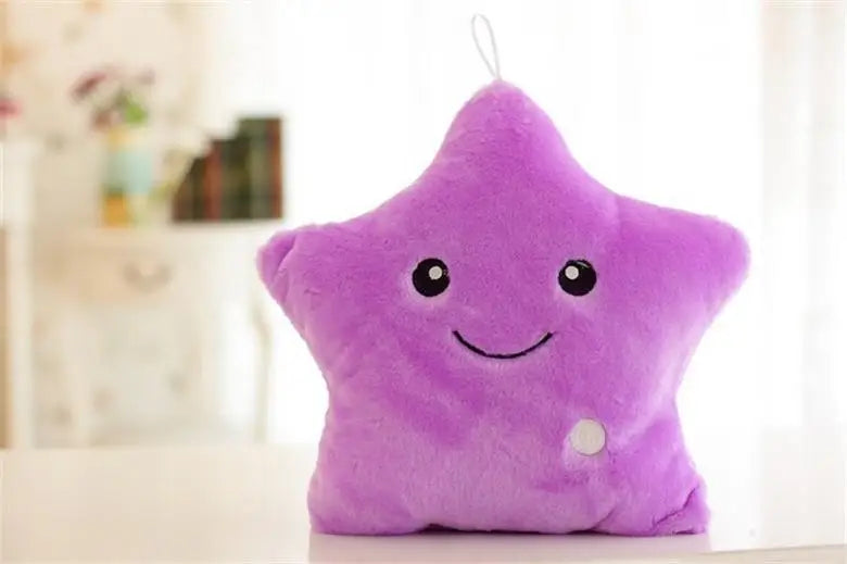 Cute purple star-shaped glowing LED plush cushion with a happy face for kids' rooms
