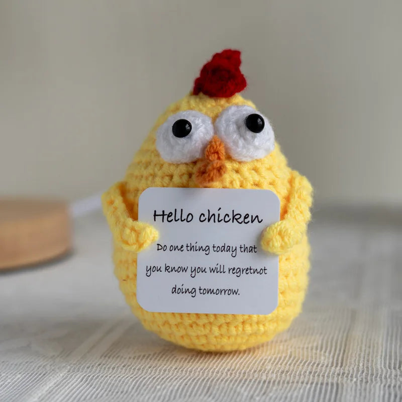 Handmade crochet emotional support buddies in a chicken design with a motivational message