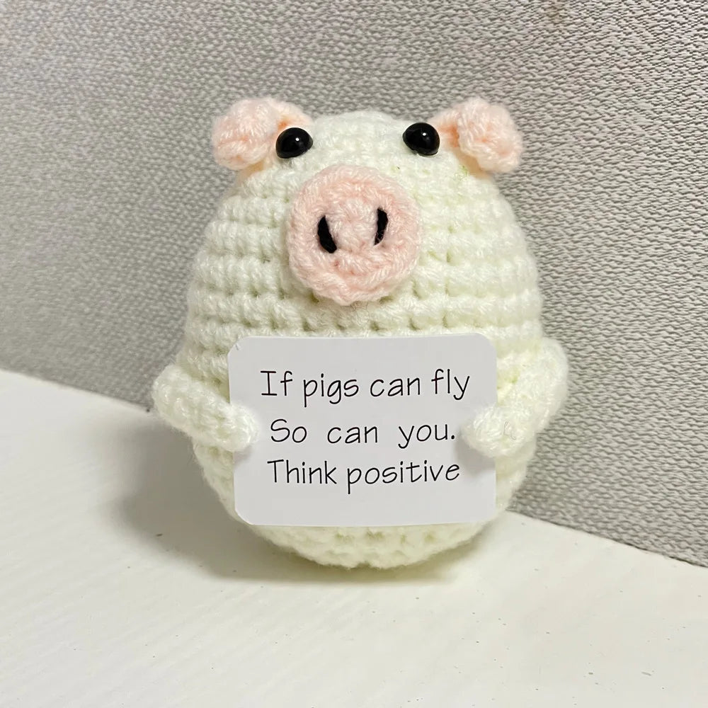Handmade crochet emotional support buddies in pig design with positive message sign