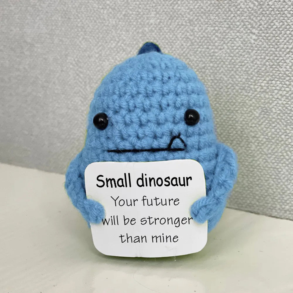 Handmade crochet emotional support buddies in dinosaur shape with encouraging message