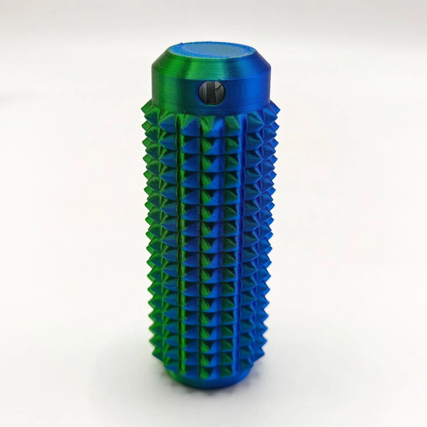 Active Playthings mini grippie sensory toy in vibrant blue and green with textured grip for tactile stimulation
