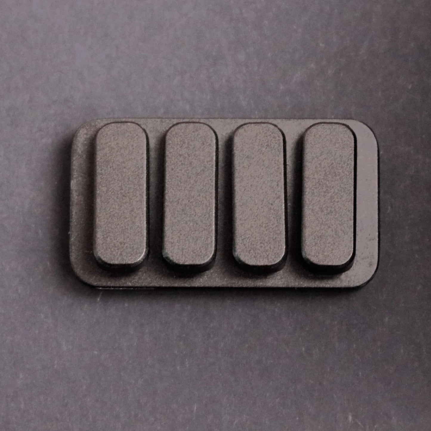 Active Playthings piano key fidget toy with four smooth buttons for sensory stimulation and stress relief