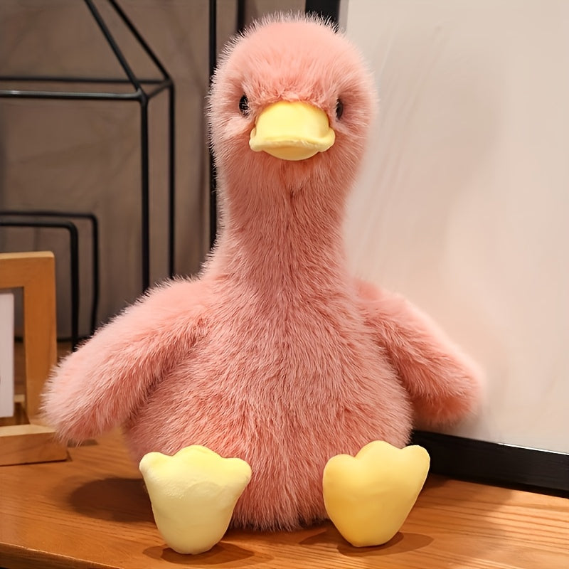 Pink snuggly duck plush toy with soft fur and yellow beak and feet by Active Playthings