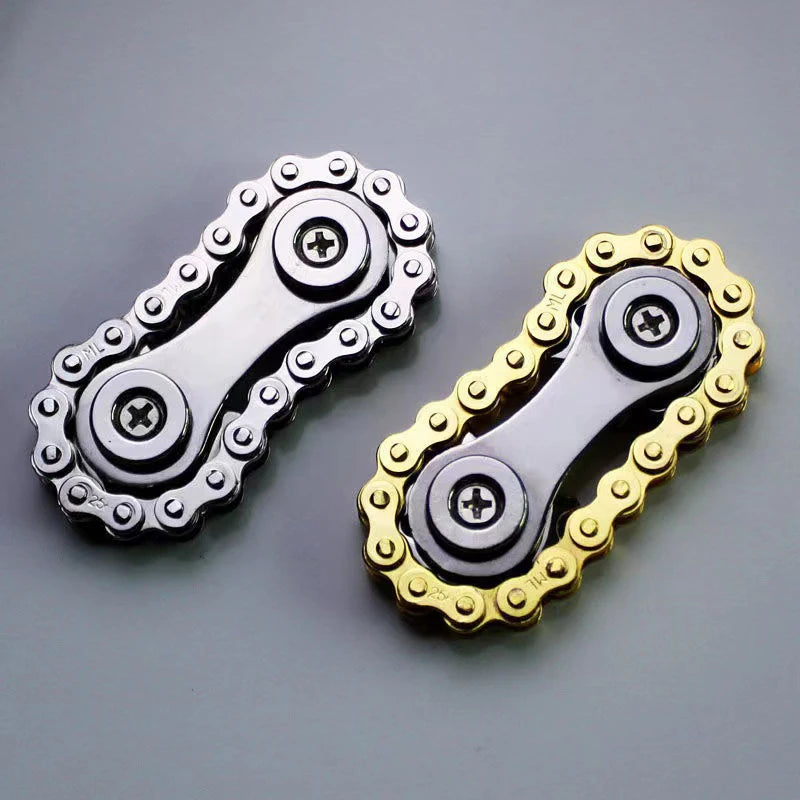 Sprockets Flywheel Fidget Spinner in silver and gold design with smooth spinning action