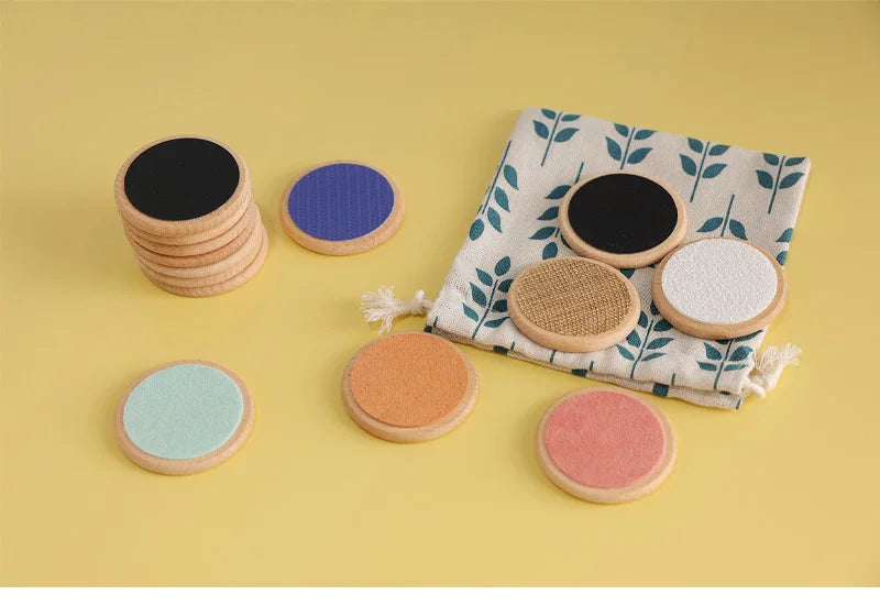 Sensory toy set with colorful textured discs and drawstring bag, ideal therapeutic touch activity toy