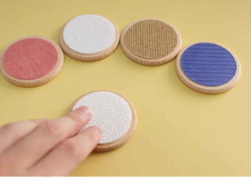 ActivePlaythings therapeutic touch activity toy with textured sensory discs for tactile exploration