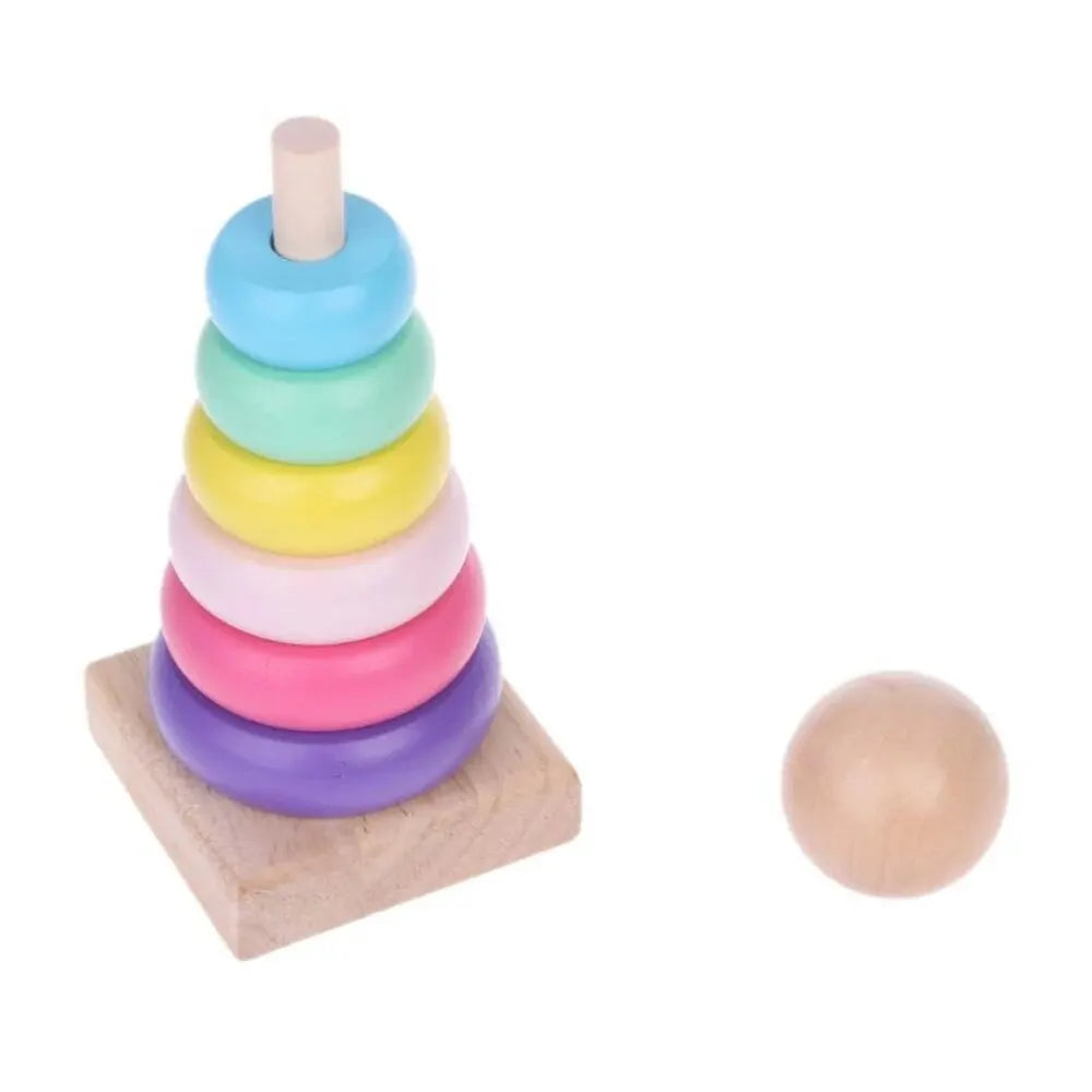 Colorful wooden rainbow stacking tower with six rings and a wooden base for toddlers