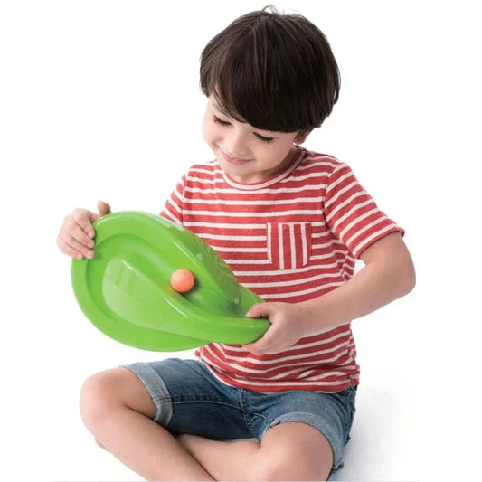 Child playing with a Montessori hand-eye coordination marble maze toy