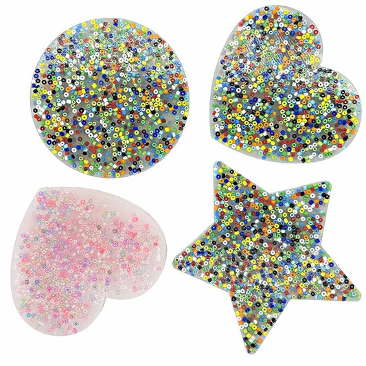 Textured fidget pads for skin picking in heart, star, and circle shapes