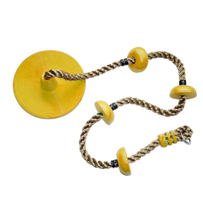 Yellow disc seat swing with knotted climbing rope