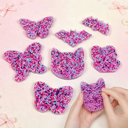 Animal skin picking pads in cat, butterfly, bat, and bear shapes
