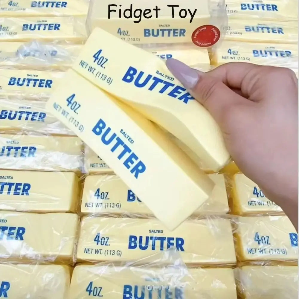 Slow-rising butter squishy pinched in hand
