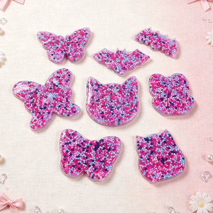 Bead pick pads in pink, purple, and blue