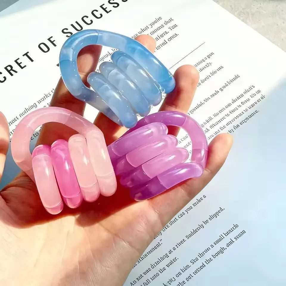 Tangle rope fidget keychain held in hand