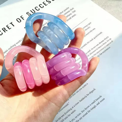 Tangle rope fidget keychain held in hand