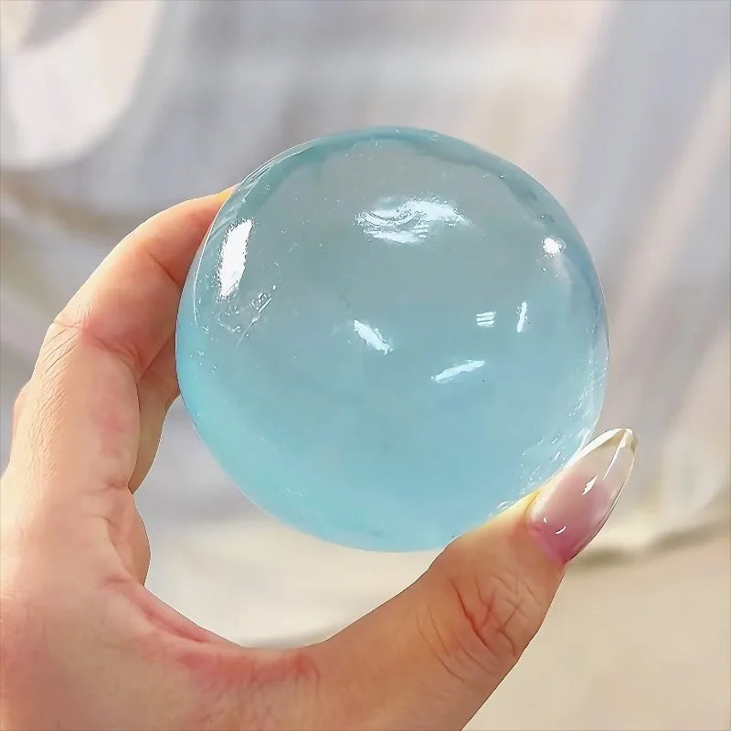 Blue mochi squishy stress ball stretched