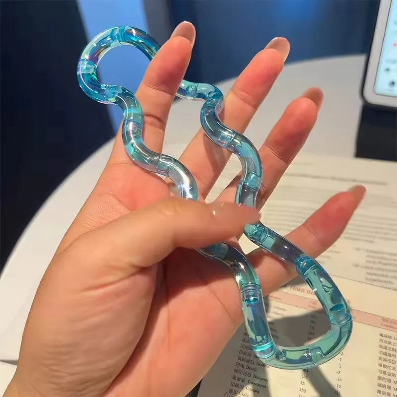 Tangle rope fidget keychain looped into a shape