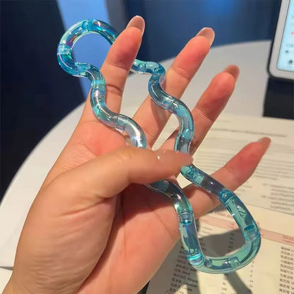 Tangle rope fidget keychain looped into a shape
