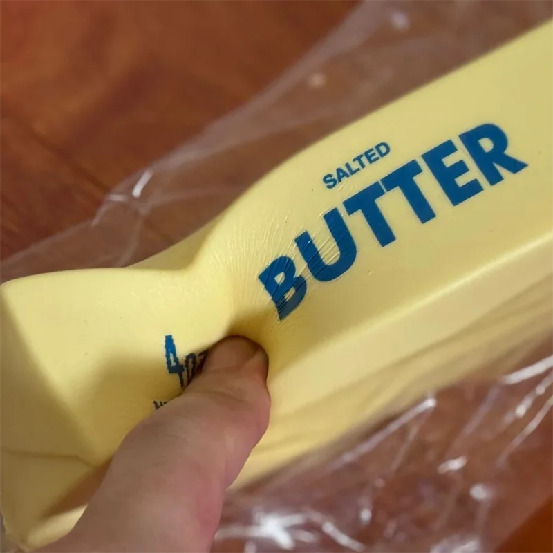 Close-up of a butter squishy being squeezed