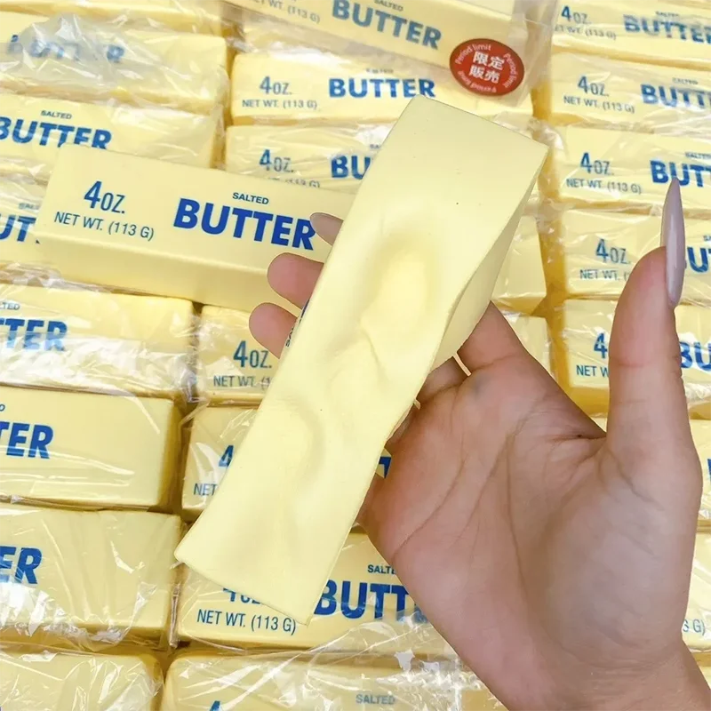 Hand holding a realistic butter squishy