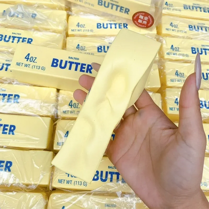 Hand holding a realistic butter squishy