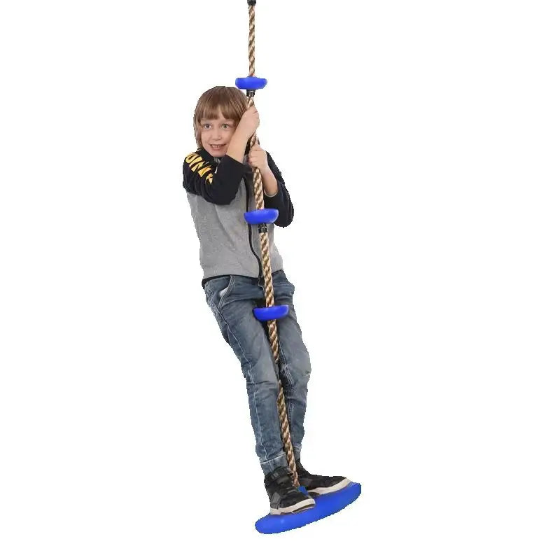 Kids climbing rope swing with disc footholds