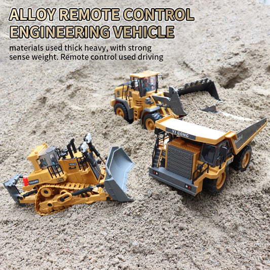 Alloy remote controlled construction toys in action on sand, featuring a bulldozer and dump truck