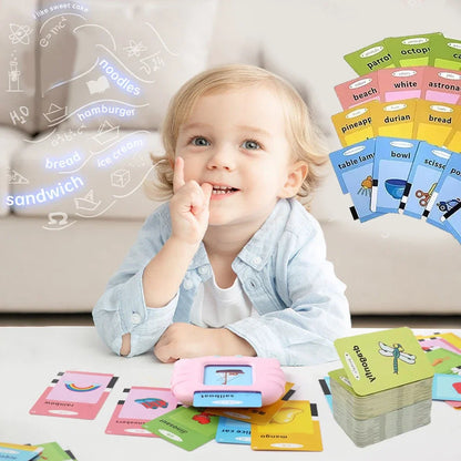 Child using an audible flashcard device with colorful Montessori toys for interactive learning
