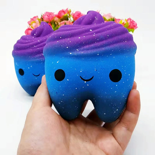 Blue Mystic Cupcake Squishy Toy with a smiling face and gradient colors for stress relief