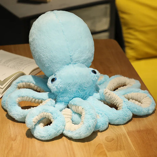 Soft blue octopus plush toy with detailed tentacles, perfect for cuddling and playtime