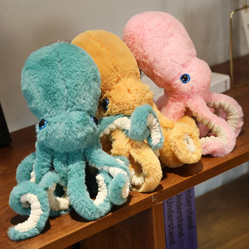 Soft and cuddly brown octopus plush toy alongside colorful plush octopuses for kids