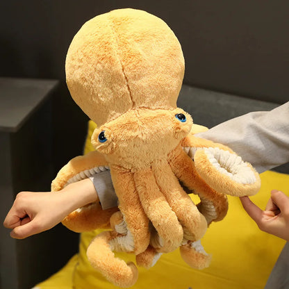 Brown octopus plush toy with soft texture and oversized limbs, perfect for cuddling and play