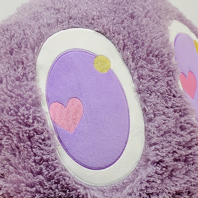 Close-up of extra large octopus plush pillow with soft purple fabric and cute heart design