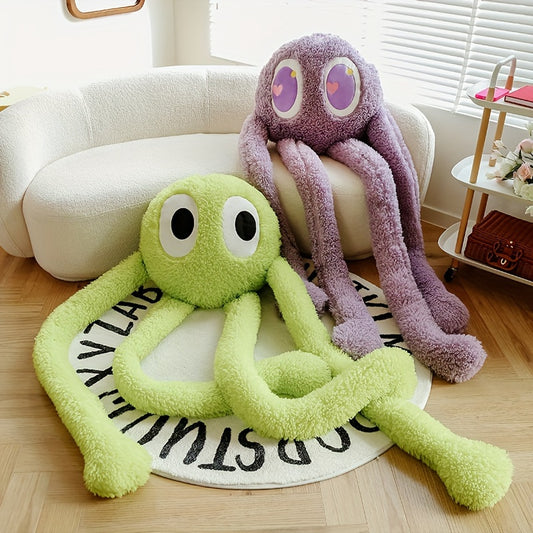 Extra large octopus plush pillow in green and purple sitting on floor near white couch by Active Playthings