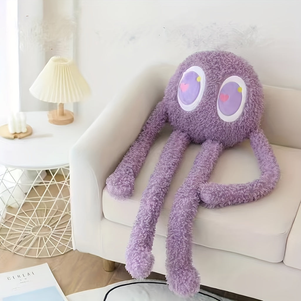 Extra large octopus plush pillow in purple with large eyes on a white sofa by a side table