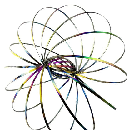 Active Playthings kinetic flow ring toy with colorful metallic loops creating dynamic motion patterns