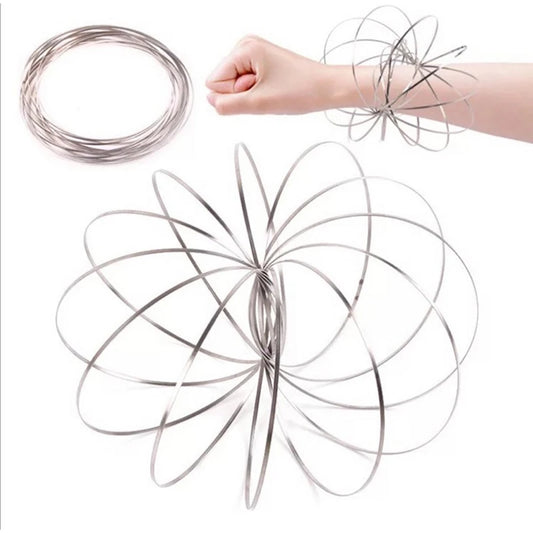 Active Playthings kinetic flow ring toy shown coiled and expanded on arm for sensory play