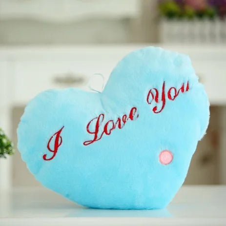 Glowing LED plush cushion in heart shape with 'I Love You' text for cozy decor