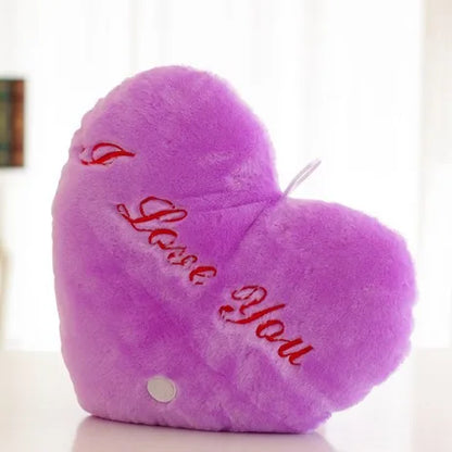 Purple heart-shaped glowing LED plush cushion with 'I Love You' text for cozy decor