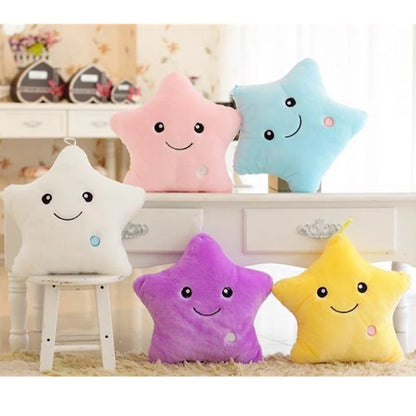 Glowing LED plush cushion in star shapes, available in pink, blue, yellow, and white colors for cozy decor
