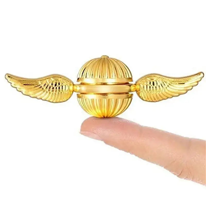 Gold magic fidget spinner featuring winged design for stress relief and focus enhancement
