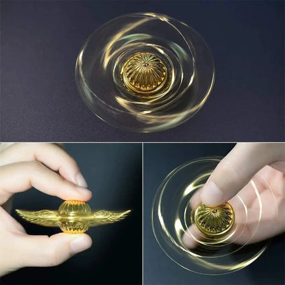 Gold magic fidget spinner with winged design, perfect for stress relief and sensory play