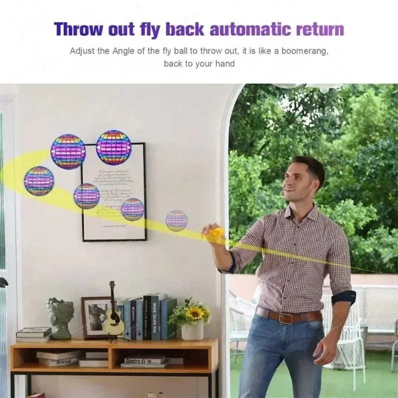 Person playing with LED boomerang flying magic orb, demonstrating its automatic return feature