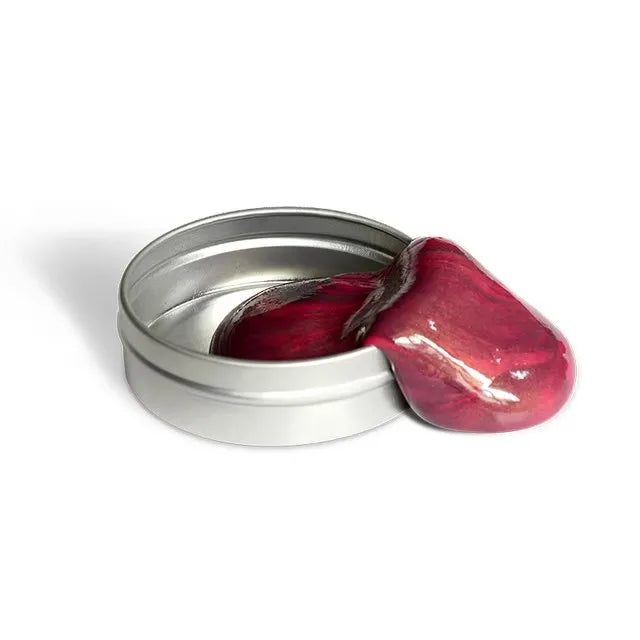 Active Playthings magnetic ferrofluid playdough in a silver tin, oozing out with a shiny finish