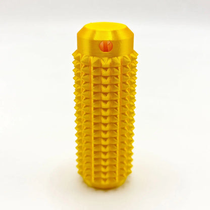 Yellow mini grippie sensory toy with textured surface for tactile stimulation and grip improvement