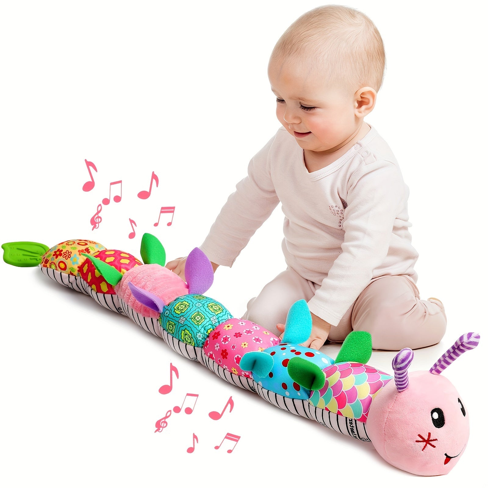 Baby playing with colorful musical stuffed animals for babies caterpillar toy from Active Playthings